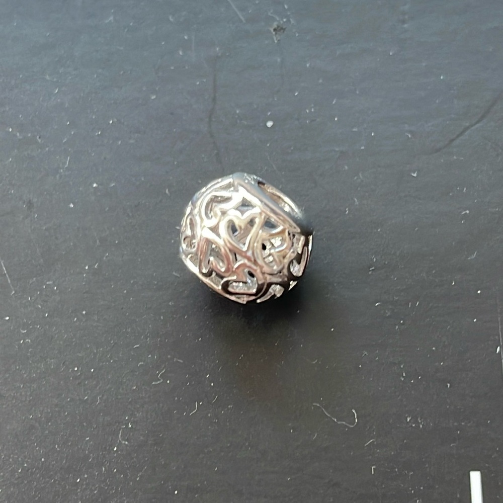 Charmed memories sterling silver floating hearts charm. Compatible with Pandora